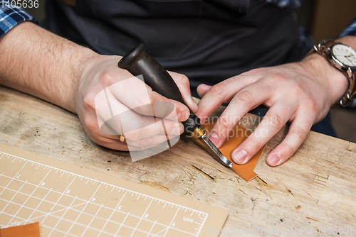 Image of Concept of handmade craft production of leather goods.