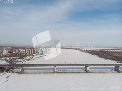 Image of Aerial shot of bridge and car driving on the bridge