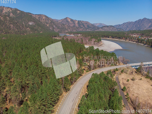 Image of Aerial view of a road in summer landscape