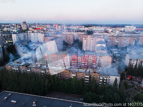 Image of Aerial shots of house burning