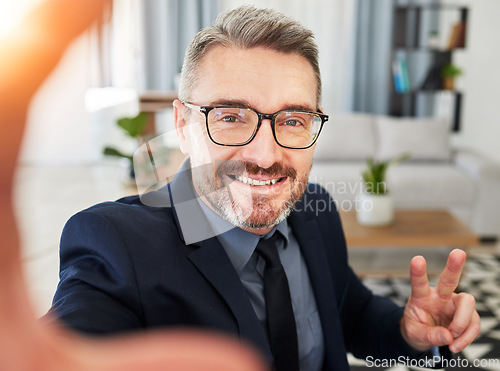 Image of Hands, peace and business man selfie in office for profile picture, photo or break. Portrait, happy and guy ceo influencer pose for podcast, blog or social media post at work with content creation