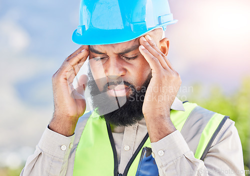 Image of Black man, architect and headache in city from stress, anxiety or mental health burnout. Frustrated and tired African male person with head pressure or fatigue during construction on outdoor site