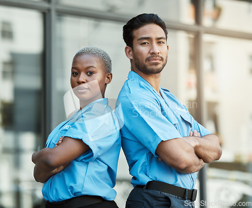 Image of People, portrait and security guard team with arms crossed in city for career safety or outdoor protection. Serious man and woman police officer in confidence, law enforcement or patrol in urban town