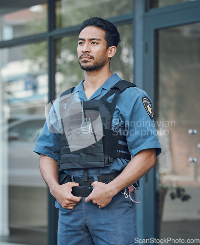 Image of Security, police officer and man in uniform in city for defense, inspection and supervision on patrol. Surveillance, law enforcement and male person in town for safety, crime and protection service