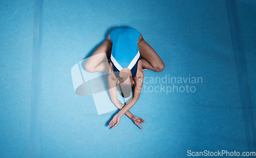 Image of Top view, gymnast and woman stretching for performance on ground with mockup space. Sports, gymnastics and athlete training, dance and exercise for fitness, healthy body and wellness for workout