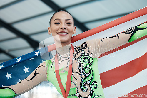 Image of Medal, winner and portrait of usa champion or woman with success in competition, gymnastics achievement or pride with American flag. Winning, athlete and celebration on podium in stadium or arena