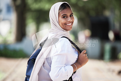 Image of Hijab, student and portrait of woman on campus for university, school and college education happy to travel to class. Smile, Islam and young religious person walking to a lecture for learning