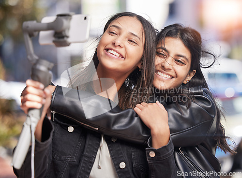 Image of Smile, selfie and hug with friends in city for social media, happy and support. Happiness, profile picture and live streaming with female influencer in outdoor for internet, post and youth together