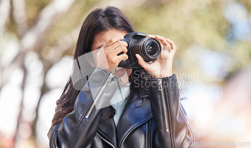 Image of Photography camera, shooting and city woman, tourist or photographer with creative memory picture, photoshoot or production. Lens, urban street and outdoor person with DSLR for artistic vision shot