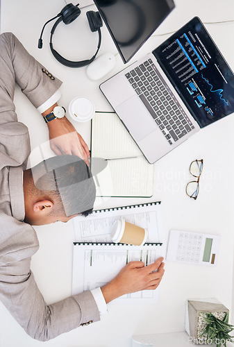 Image of Above, tired and a businessman with work burnout, investment or financial analysis stress. Desk, documents and an audit employee sleeping in an office with paperwork or finance data deadline