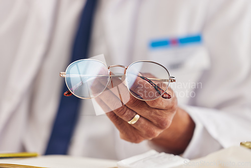 Image of Professional, man and hands with glasses for vision or prescription lens for eyesight. Closeup, eyewear and frames male person with spectacles for wellness in workplace for focus with seeing.