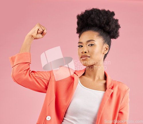Image of Portrait, black woman and flex for power, winning and empowerment against a studio background. Face, female person and model with strength, arm muscle and achievement with success, strong and energy