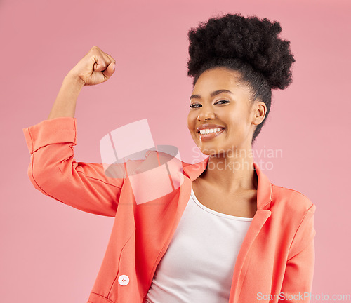 Image of Portrait, black woman and flex for power, energy and happiness against a studio background. Face, female person and model with strength, arm muscle and achievement with success, challenge and winning