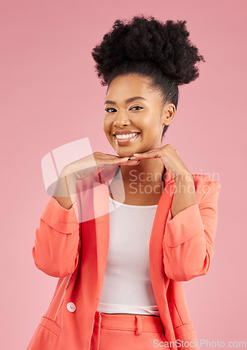 Image of Portrait, fashion and beauty with an afro woman in studio isolated on pink background for trendy style. Smile, hair and face with a happy or confident young african person posing in a clothes outfit