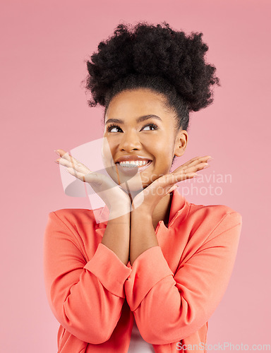 Image of Fashion, beauty and thinking with an afro woman in studio isolated on pink background for trendy style. Smile, hair and idea with a happy or confident young african person posing in a clothes outfit
