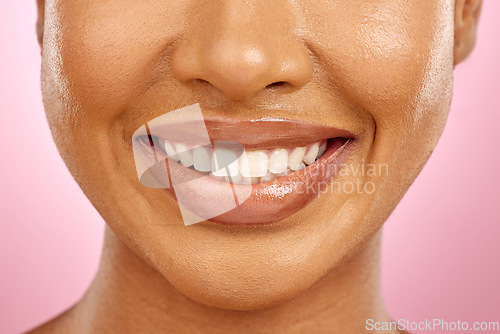 Image of Woman, mouth and healthy smile in studio for dentistry, teeth whitening or veneers by pink background. Girl, model and clean with dental healthcare, beauty and wellness with glow on facial skin