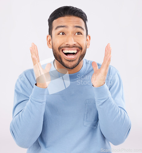 Image of Wow, smile and happy asian man in studio for celebration, news or sale promo on grey background. Face, winner and Japanese guy customer excited for competition, lotto or cashback bonus prize reward