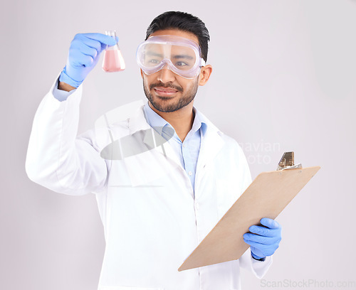 Image of Scientist man, beaker and thinking with checklist, analysis and ppe goggles in studio by white background. Asian science expert, clipboard and paperwork for chemistry, ideas and study at pharma job