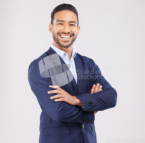 Image of Portrait, business and asian man in studio with arms crossed for professional style of broker, financial advisor or suit on white background. Happy investment planner, corporate fashion or confidence