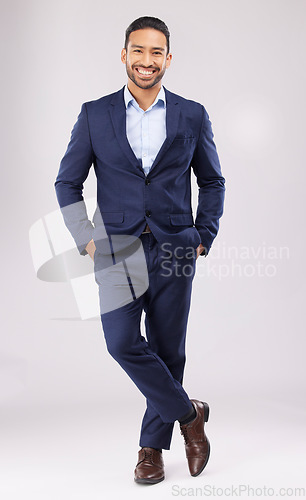 Image of Portrait, business and asian man in studio with suit for financial trading, professional style and entrepreneur on white background. Happy young male trader, corporate fashion and confidence of pride