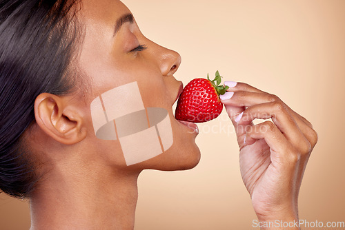 Image of Eating, strawberry and profile of woman for skincare with natural beauty or benefits from healthy nutrition, diet and fruit. Girl, bite of food and vitamin c for skin to glow, shine or wellness