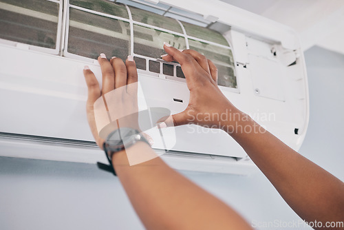 Image of Hands of person, technician and ac repair for electrical system, fan maintenance and labor. Closeup of mechanic, electrician and engineering services to fix aircon, hvac and air conditioning machine