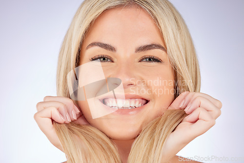 Image of Portrait, girl and happiness with haircare or beauty with luxury salon with shine in white background. Hairstyle, woman and happy face with healthy shine or cosmetics in studio with glow or growth.