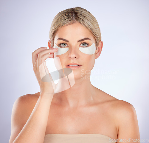 Image of Skincare, portrait and woman with eye patch for facial hydration, beauty care or collagenwhite. glow. Anti aging product, cosmetic repair benefits or person with studio face mask on white background