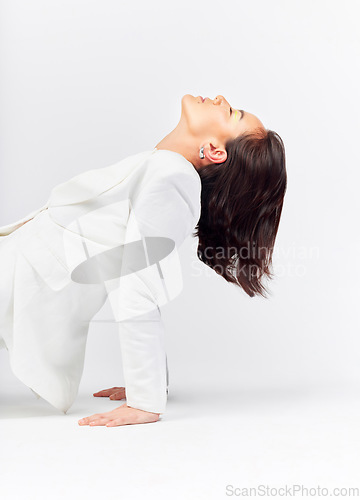 Image of Fashion, magazine cover and a model woman in studio on a white background for trendy or classy style. Profile, beauty and clothes with a young female person posing eyes closed for feminine elegance