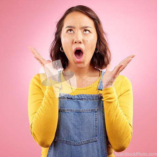 Image of Surprise, news and asian woman with wow face in studio for deal, offer or promo on pink background. Omg, wtf and Japanese lady with open mouth shock emoji for coming soon, discount or sign up sale