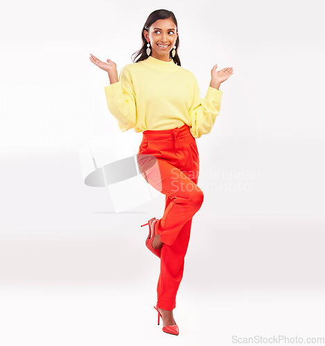 Image of Happy, fashion and Indian woman with surprise in studio with confidence, happiness and pride. Professional, business and excited female person in trendy clothes, style and clothes on white background