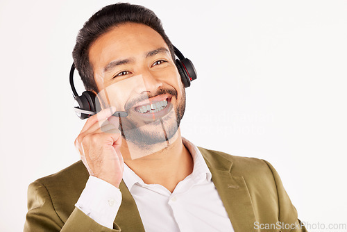 Image of Call center, asian man and smile in studio for customer service, sales advisory and contact us on white background. Face of CRM consultant, IT support or communication of FAQ telemarketing questions