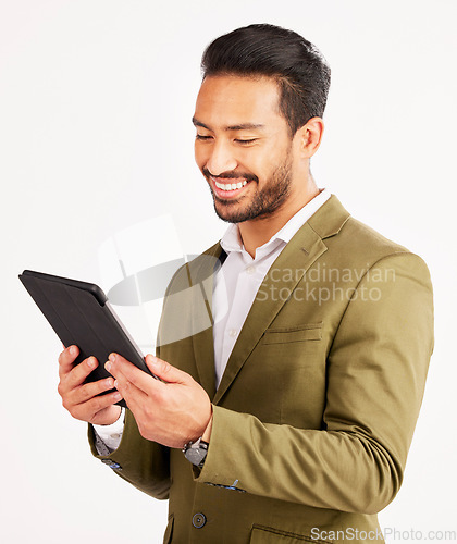 Image of Asian man, business and tablet in studio for online planning, stock market research and internet info on white background. Happy trader, digital technology and network connection for app on website