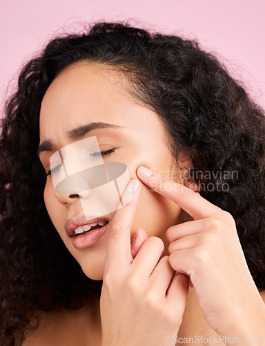Image of Skincare, woman and acne or squeeze pimple with beauty in pink or studio background for self care. Natural, face and girl with blackhead or dermatology problem with cosmetic or facial treatment.