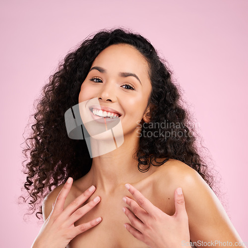 Image of Face, skincare and beauty of happy woman in studio isolated on a pink background. Portrait, smile and natural model with cosmetics in spa facial treatment for aesthetic, wellness and healthy skin