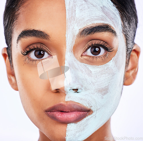 Image of Skincare, portrait and woman in studio with facial, half and cosmetic treatment or dermatology. Face, mask and Indian female wellness model with cream, comparison or result, beauty and satisfaction