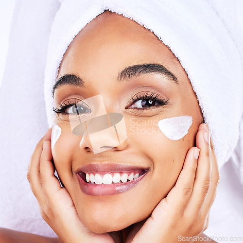 Image of Hands, face cream and portrait of woman with skincare, lotion or hydration application in studio. Soft, glowing skin and happy lady model with facial, mask or sunscreen, moisturizer or beauty routine
