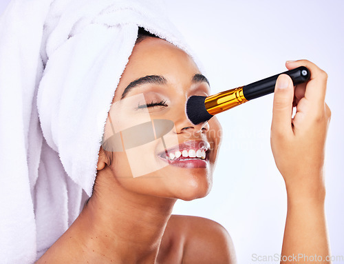 Image of Smile, beauty and Indian woman with makeup brush in studio for glamour, cosmetic or application on grey background. Happy, tools and female model with nose, powder or contour, self love or results