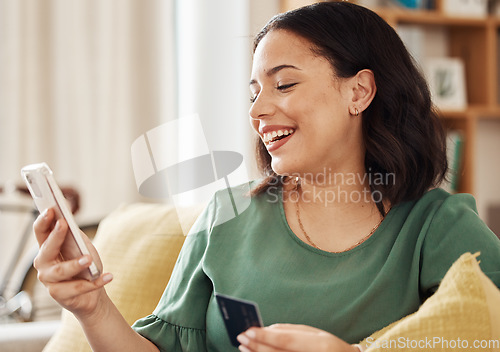 Image of Phone, credit card and woman laugh with online shopping and banking at home. Ecommerce, mobile cashback and sale with digital payment on web and easy pay with discount and smile from website checkout