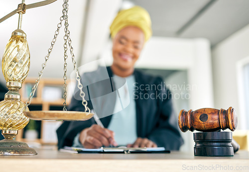 Image of Legal, scale and woman judge writing for an investigation document or criminal case in a law firm. Court hammer, administration and lawyer working on justice or planning policy in attorney office