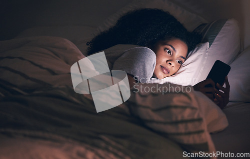 Image of Streaming, night and phone with woman in bedroom for social media app, insomnia and networking. Communication, contact and internet with female person in bed at home for mobile, online and technology