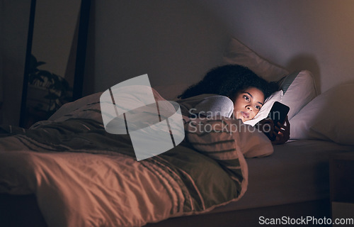 Image of Tired, night and phone with woman in bedroom for social media app, insomnia and networking. Communication, contact and internet with female person in bed at home for mobile, online and technology