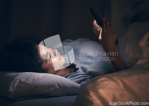 Image of App, night and phone with woman in bedroom for social media, insomnia and networking. Communication, contact and internet with female person relax in bed at home for mobile, online and technology