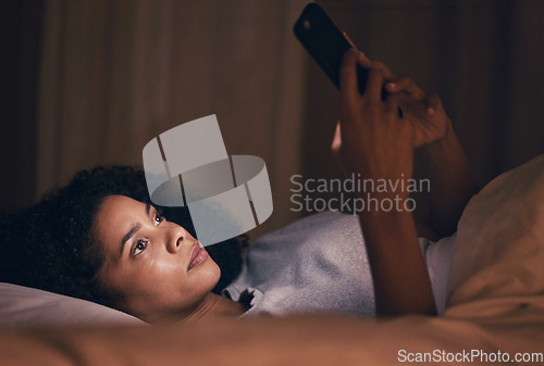 Image of Search, night and phone with woman in bedroom for social media app, insomnia and networking. Communication, contact and internet with female person in bed at home for mobile, online and technology