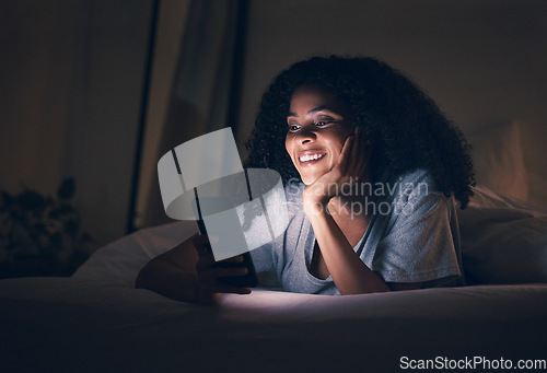 Image of Insomnia, smile and phone with woman in bedroom for social media app, night and networking. Communication, contact and internet with female person in bed at home for mobile, online and technology