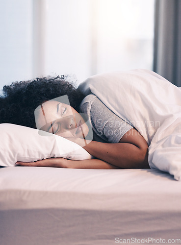 Image of Sleeping, African woman and bed with morning nap in home with rest feeling calm with peace. House, bedroom and tired female person relax and comfortable on a pillow with blanket dreaming on weekend