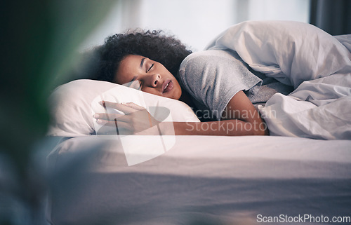 Image of Sleeping, black woman and bed with morning nap in home with rest feeling calm with peace. House, bedroom and tired female person relax and comfortable on a pillow with blanket dreaming on weekend