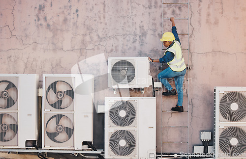 Image of Engineer, roof and outdoor for air conditioning maintenance, construction or inspection for system, building or industry, African technician, ladder and ac tech with check, analysis or hvac services