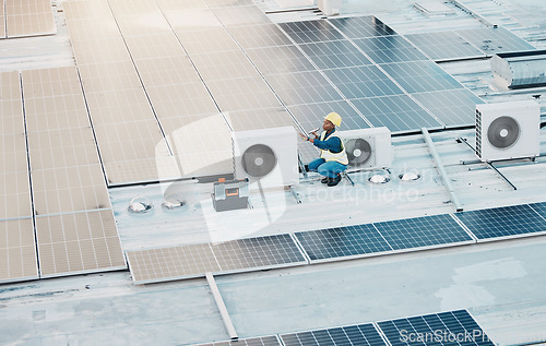 Image of Engineer woman, speaker call and phone in construction, solar energy and maintenance for air conditioner on rooftop. Technician, photovoltaic tech and hvac on roof, building and electricity in city