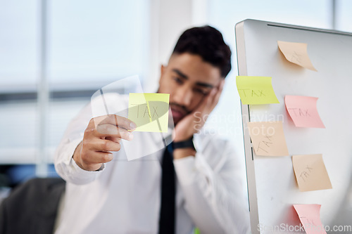 Image of Tax, hand and business man with sticky note in office for debt, audit fail and financial crisis on computer. Stress, problem and professional with paper reminder for bankruptcy, bills and challenge